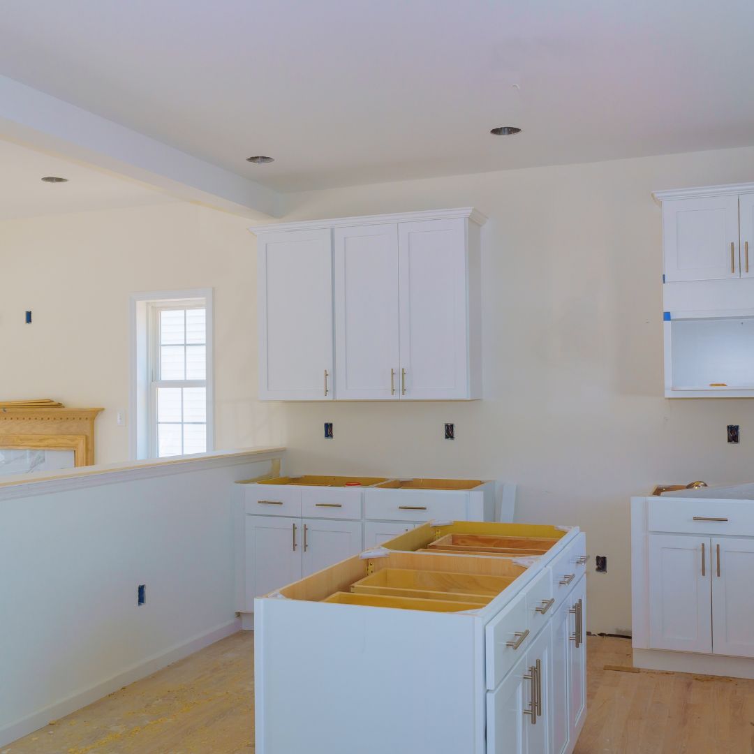 Farmhouse-Style Custom Kitchen
A charming farmhouse-style custom kitchen with white shaker cabinets, a large butcher block island, and vintage-style brass fixtures.