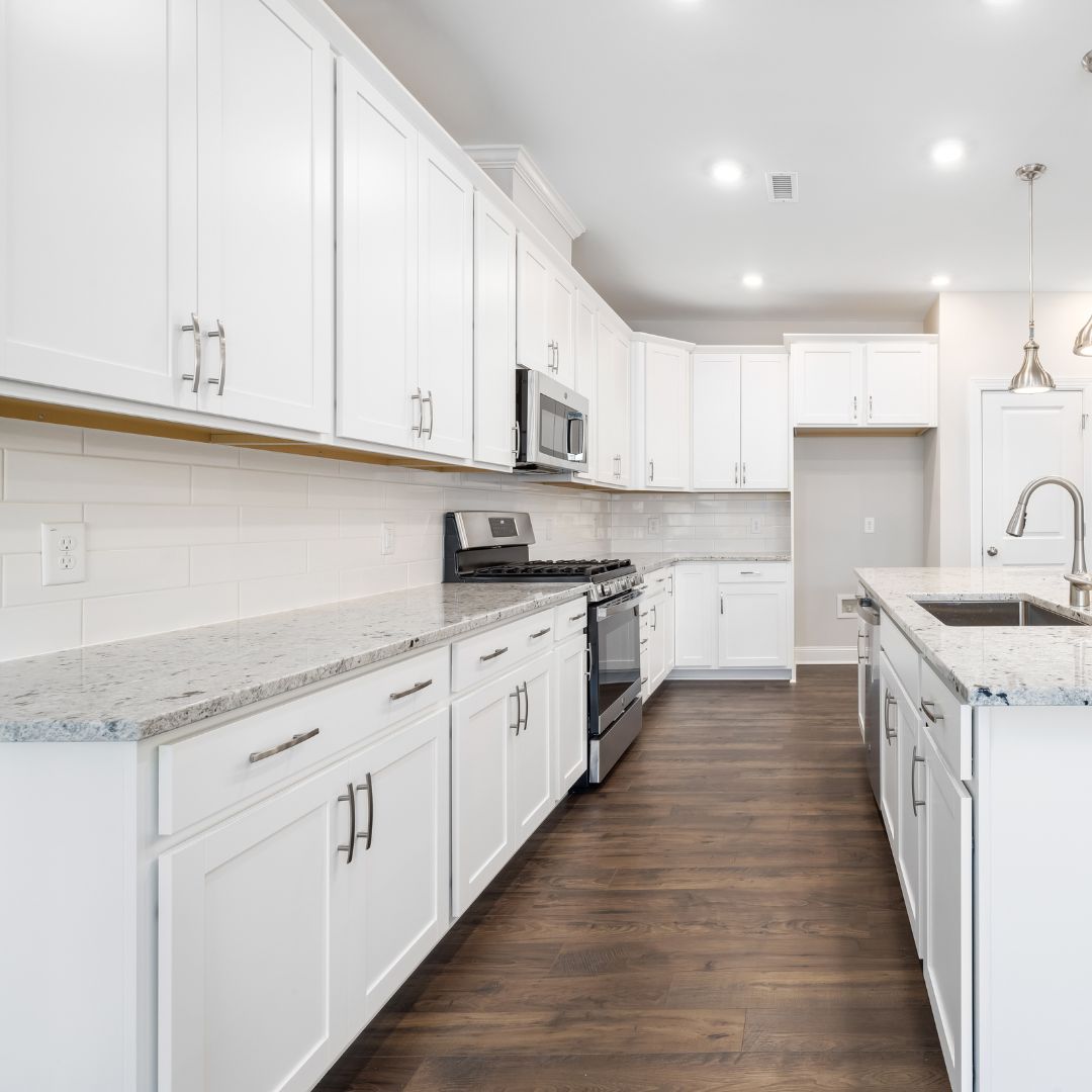 A custom kitchen crafted by the Fix It Mates joinery team in Dubai, featuring sleek cabinetry with a polished wooden finish, spacious countertops, and modern fittings, designed to blend functionality and luxury in a contemporary home setting.