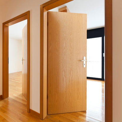 A custom wooden door crafted by Fix It Mates, featuring a sturdy wooden frame with a smooth finish, showcasing natural wood grain patterns and modern hardware, designed to enhance the aesthetic and functionality of any interior or exterior space.